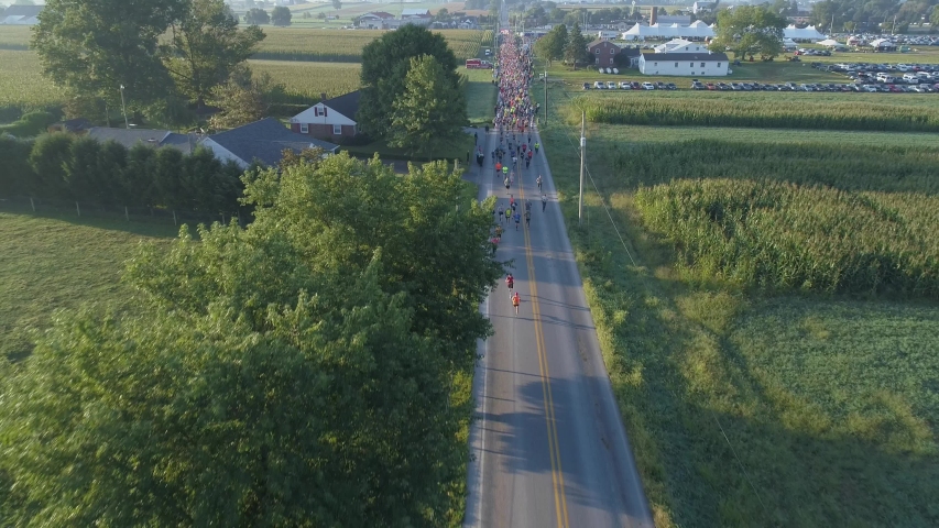 Aerial View of the Start of a Half Marathon at a Festival on a Summer Morning in the Amish Country
