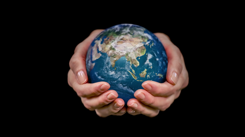 Female hands holding a rotating hyperrealistic Earth over black background.  Royalty-Free Stock Footage #1041060731