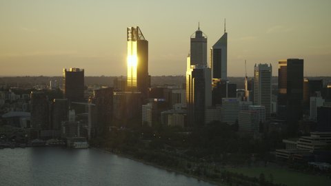 Perth Australia - June 2019: Aerial view sunset on Brookfield Place and Perth city skyscrapers with residential apartment buildings Langley Park Western Australia