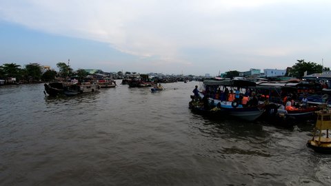 Vietnam - June 2019: Cai Rang Can Tho tourist boats on the Mekong with passengers excited to see the floating markets South East Asia travel and tourism
