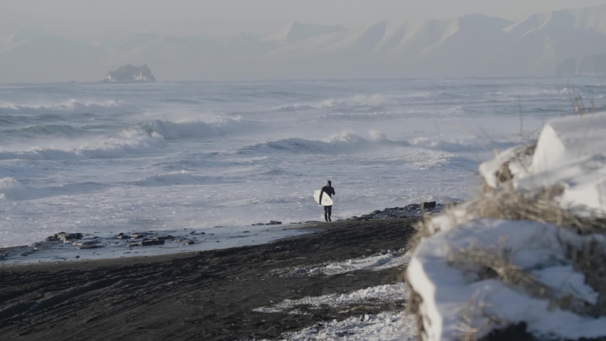 Winter surfing on the Pacific ocean coast