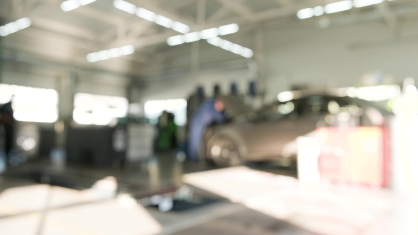 Auto repair service. Blurred background. | Shutterstock HD Video #1041091600