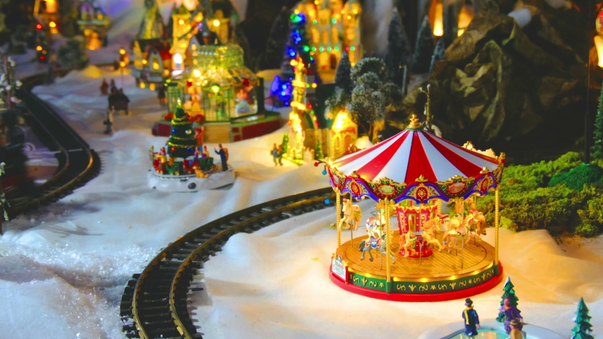 vintage toy store with carousel train and balloon in white snow christmas set .