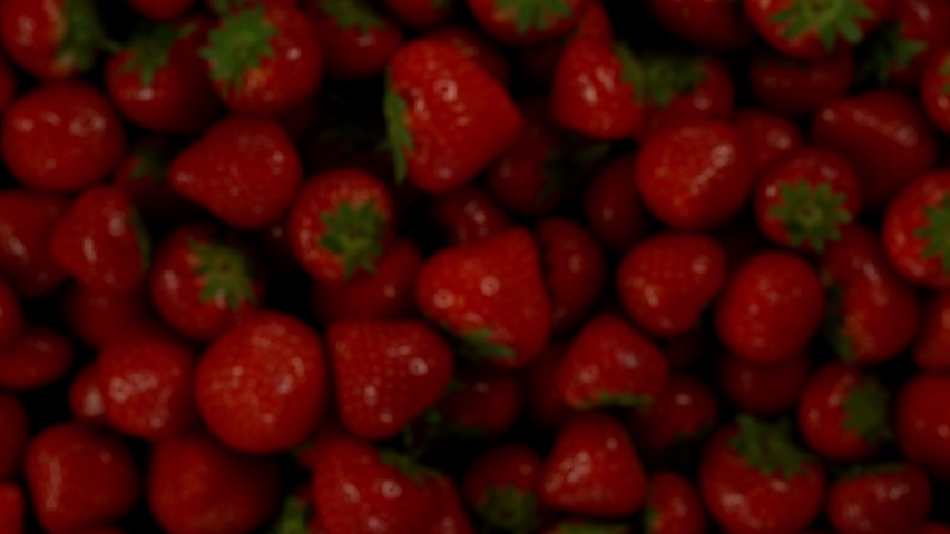 Super slow motion of strawberries isolated on black background. Filmed on high speed cinema camera, 1000 fps. Royalty-Free Stock Footage #1041106318
