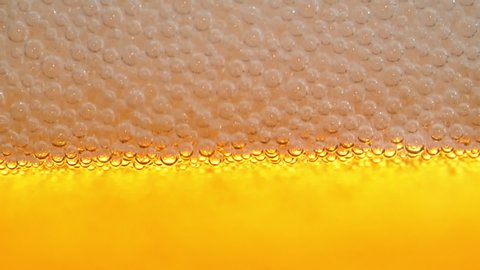 HD - Beer foam close-up. Slow motion