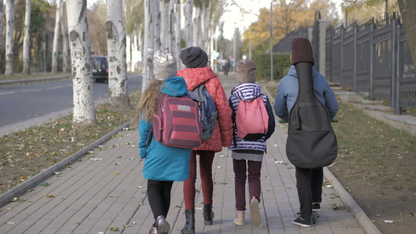 Group of kids going to school together