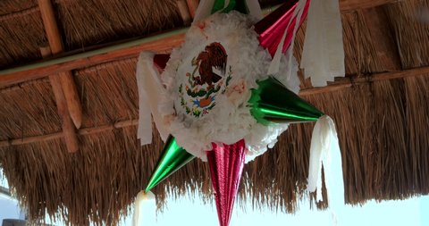 Traditional Mexican Piñata with Mexican Flag Colors and National Coat of Arms