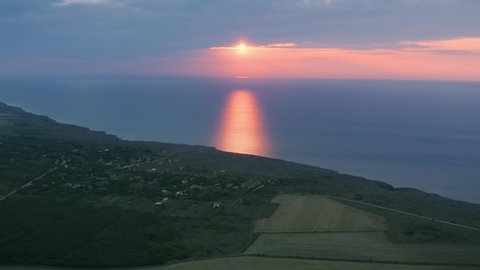 Aerial view of sunrise in the sea