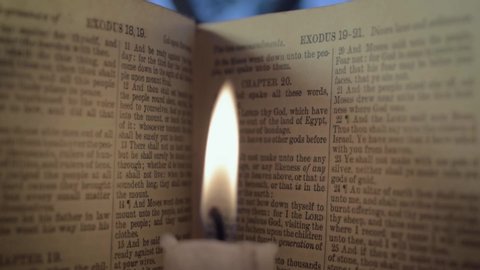 Dewsbury , West Yorkshire / United Kingdom (UK) - 03 03 2019: Bible pages with candle