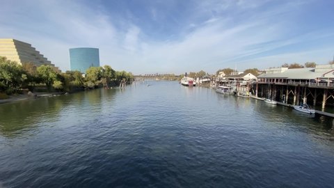 Sacramento, CA - November 16, 2019: Wide angle view of Sacramento river with Old town and Ziggurat building both in view. 