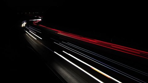 white and red light trails of traffic