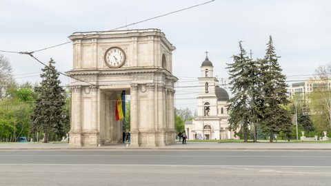 Chisinau, Moldova - the Triumphal arch next to the Nativity Cathedral in the center of Chisinau, Moldova. Timelapse of the Triumphal arch and Nativity Cathedral. Establishing shot of Chisinau, Moldova