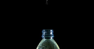 Water Exploding and Splashing on Bottle against Black Background, Slow motion 4K