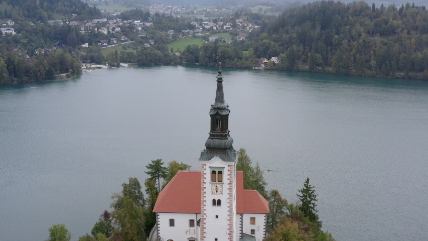 Aerial panoramic view of Lake Bled with famous Bled Island and Bled Castle in the background in scenic morning light