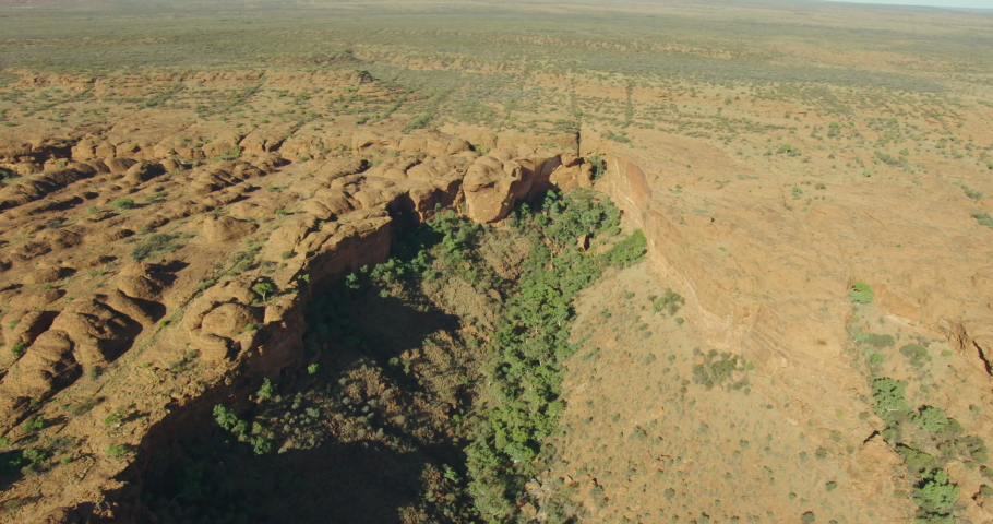 Aerial view of Kings Canyon scorched by the heat from the sun Aboriginal lands the Red Centre Watarrka National Park Northern Territory Australia travel and tourism