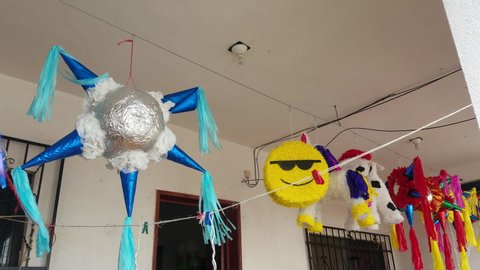 Playa del Carmen , quintanaroo / Mexico - 12 29 2018: piñata's hanging from the roof, ready to be used.