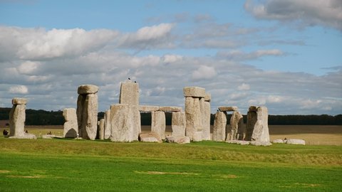 Wide shot of Stonehenge and Wiltshire Countryside in England, UK. The stone circle dates to 3000 BC