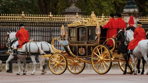 LONDON, circa 2019 - Prince Charles enters Buckingham Palace the state coach after the State Opening of the Parliament in London, England, UK