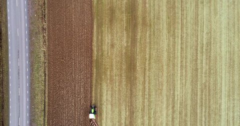 Tractor at the field captured from above