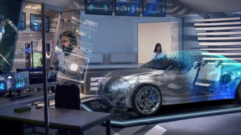 Mockup of Electric Vehicle: Automotive engineers working on design of Detailed Electric Car using futuristic transparent screens. High-tech facility. Hologram of full car appears on top of chassis.