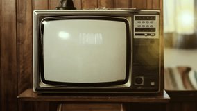 1969. Historical Footage Of The Saturn V Rocket Launch Of Apollo 11 Mission, on a Vintage Television. Elements of this Video furnished by NASA.
