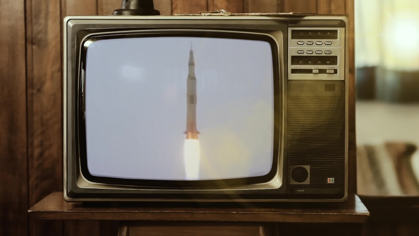 1969. Historical Footage Of The Saturn V Rocket Launch Of Apollo 11 Mission, on a Vintage Television. Elements of this Video furnished by NASA. Royalty-Free Stock Footage #1041245926