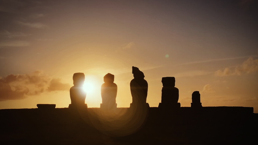 Moai Silhouettes Against Sunset Sky, Slow Zoom In Shot, Easter Island