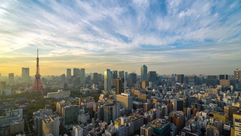 TOKYO, JAPAN - November 1,2019 : 4K UHD time lapse day to night of Tokyo city skyline view and building at Japan with sunset and colorful skyline. Beautiful of cloud and sky in dusk and twillight.