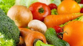 4k closeup footage of camera moving over fresh seasonal vegetables covered with water droplets or dew. Concept of healthy nutrition and organic food. Perfect background for vegetarian or vegan - Powered by Shutterstock - Get 15% off with code: PIKWIZARD15
