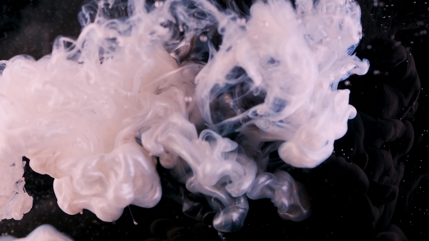 Black and white. Movement and mixing, abstract footage with movement and mutual penetration. The merging of two different concepts