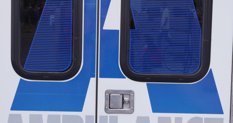 Tilt down of Toronto Ambulance rear - slow motion - shot on RED