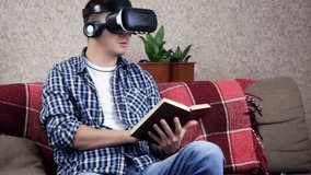 Young Man in Virtual Reality Headset with a Book