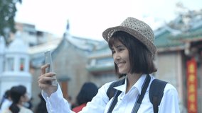 Travel concept. Young woman is broadcasting live tourism in the city. 
