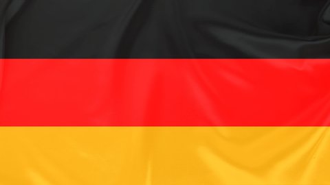 beautiful silk German flag draped with small folds, gently flowing, concept of public policy, economy, tourism, copy space