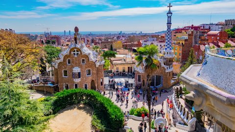 Barcelona, Spain: Timelapse of the Dragon Stairway and the Casa del Guarda at Park Guell. 