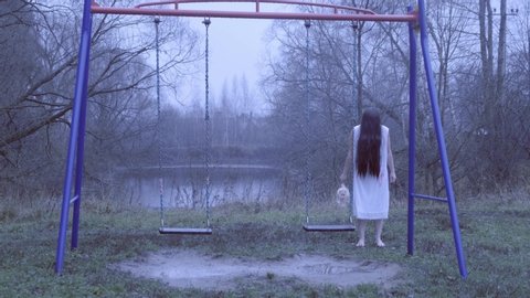 Ghost of Dead Girl Stands Stock Footage Video (100% Royalty-free)  1040876381 | Shutterstock