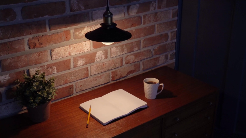A book under an electric light