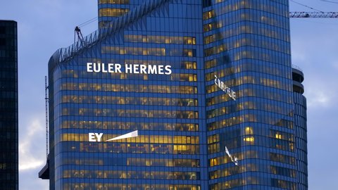 Paris, France - June 2019 : Euler Hermes Tower in La Defense business district in Paris France, top of the tower at sunset