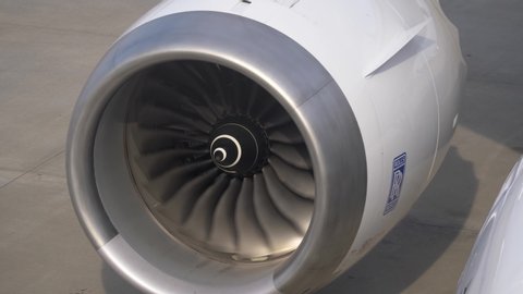 Rolls-Royce branded jet engine with a spinning turbine. TOKYO, JAPAN NOVEMBER 2019