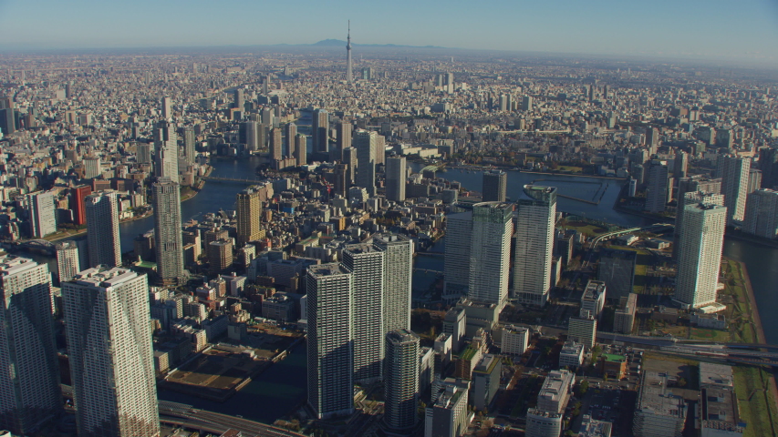 Tokyo, Japan circa-2018. Flying over city. Shot from helicopter with RED camera.