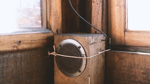 Old Radio Speaker in the Cabin of a Traditional Fishing Boat in the Port of Mar del Plata, Argentina. Close-Up. Zoom In. 