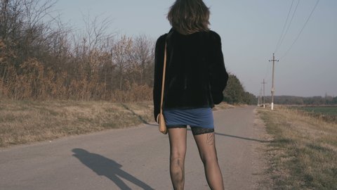 Female Prostitute Standing On The Road