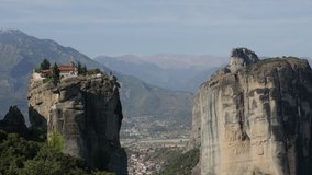 Meteora rocks with monastery of the Holy Trinity 4K tilting video