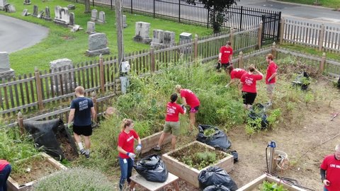 Lancaster , Pennsylvania / United States - 09 07 2018: United Way of Lancaster County at charitable community work cleaning up a small garden at the 27th Day of Caring