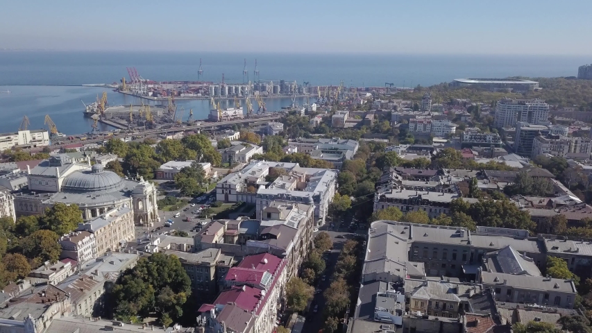 Aerial view from drone to Odessa National Academic Theater of Opera and Ballet and seaport in Odessa city, Ukraine. Slow motion, 4K UHD video 3840, 2160p.