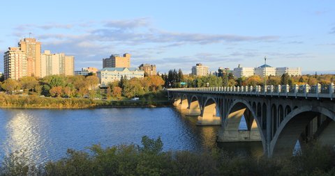 Scene of Saskatoon, Canada cityscape by river 4K