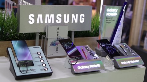 Belgrade, Serbia - November 20, 2019: New Samsung Galaxy S10+ Note 10 and Note 10+ mobile smartphones are shown on retail display in electronic store. Brand logo in the background.