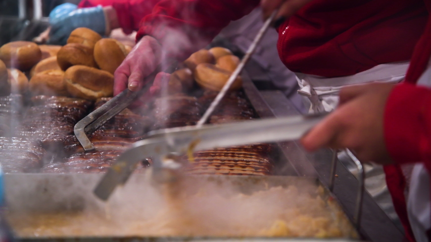 Nuremberg, Germany: Bratwurst booth on the Christkindlesmarkt. It is one of the most famous Christmas markets in the world.