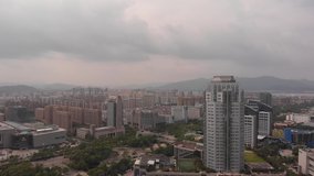 Taizhou city in Zhejiang province. Jiaojiang District. Aerial view in 4K of the city in China. Skyscrapers and buildings