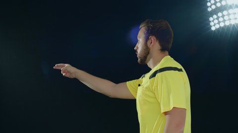 Football Soccer referee showing VAR Video Assistant Referee with hands, 4k slow motion